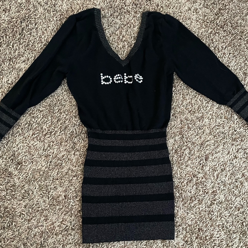 Black with silver trim and rhinestone letters sweater